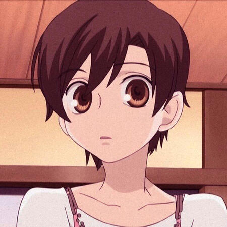 haruhi from OHSHC looking at you. she has a white shirt and pink overalls on.