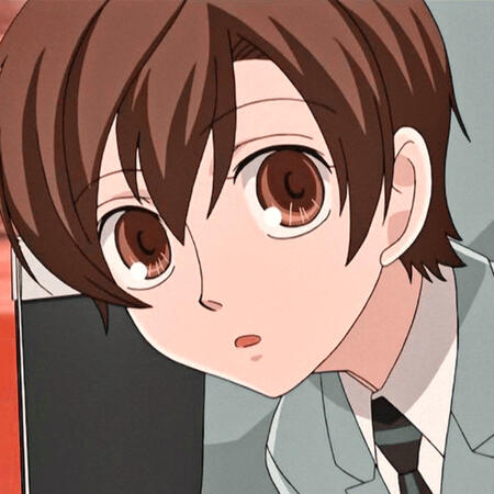 haruhi from OHSHC looking at you. she has her blue suit and tie on, and is leaning into frame from the right.